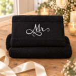 black towel with the names Mr