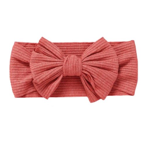 Coral colored headband for baby