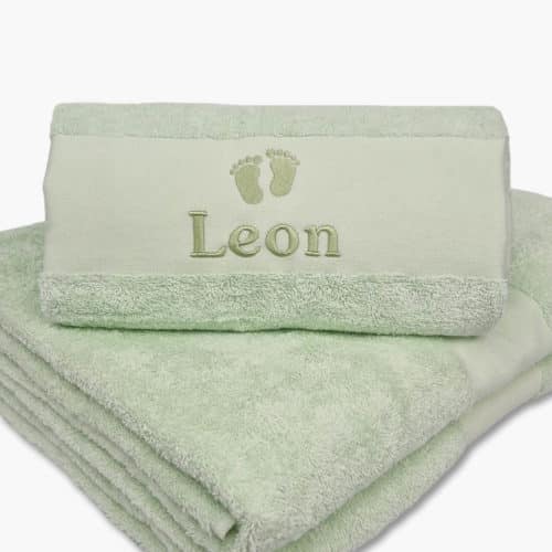 pastel mint colored towel with name embroidered