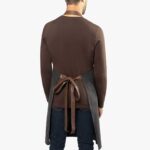Back view of apron showing the adjustable neck strap and waist ties