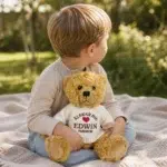 Child hugging a personalized teddy bear