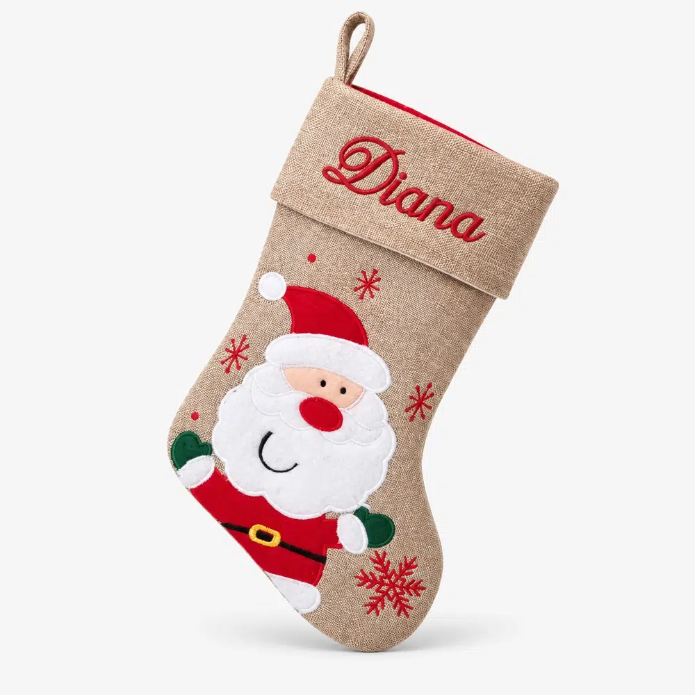 Brown Christmas stocking with happy Santa