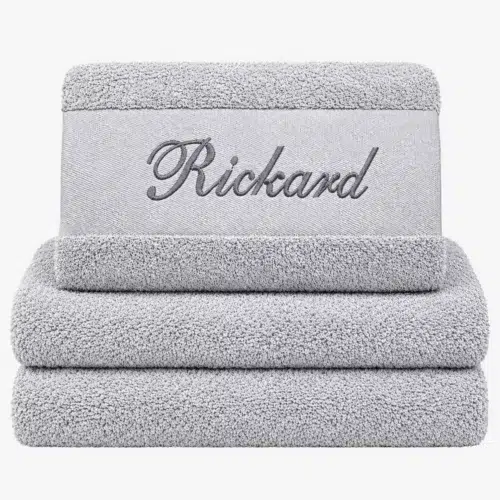 Gray towel with name and black text