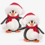 Baby Julius penguin soft toy from Bukowski with Santa hat and red scarf, 15 cm